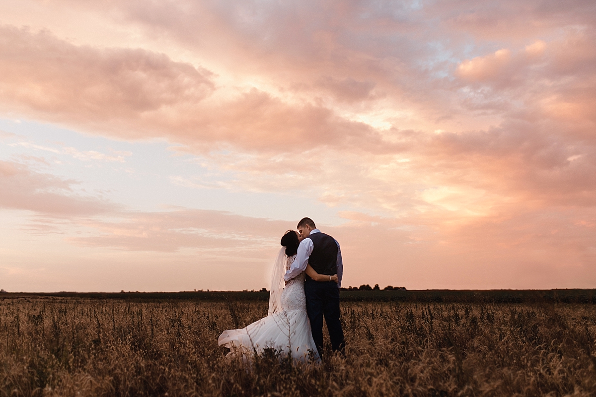 adventurous bride and groom sunset photos