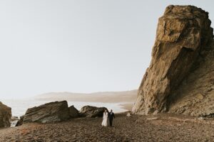 bride and groom on california coast